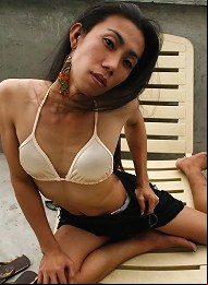 Sexy Asian ladyboy toying he...